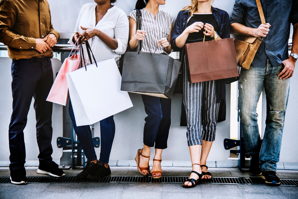 Friends out shopping with gift bags