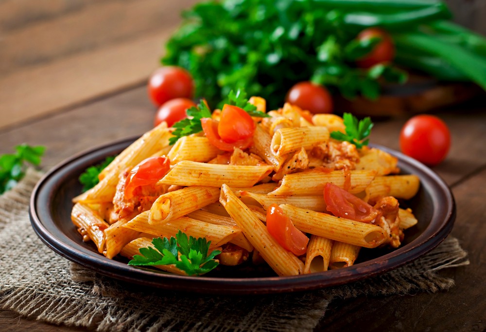 Plate of penne pasta at a restaurant
